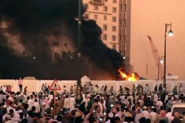 Muslim worshippers gather after a suicide bomber detonated a device near the security headquarters of the Prophet''s Mosque in Medina