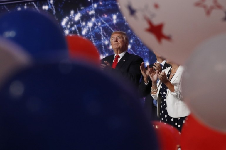 Republican U.S. presidential nominee Donald Trump watches balloons, confetti and electronic fireworks at the conclusion of the final session of the Republican National Convention in Cleveland
