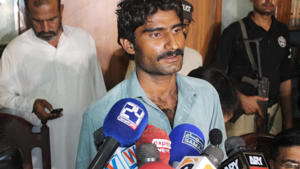 Waseem Azeem, the brother of slain Pakistani social media celebrity Qandeel Baloch, is presented to media by the police after his arrest in Multan [EPA]