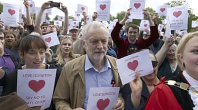 Jeremy Corbyn poses with supporters after speaking at an anti-racism rally in London, Britain [Reuters]