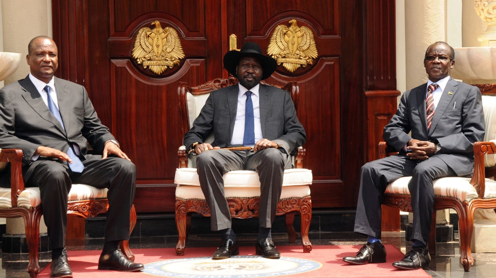 President Kiir with First Vice President Taban Deng, left, and Second Vice President James Wani Igga, right, on Tuesday, July 26 [Reuters]