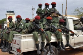 Members of the SPLM/A-In Opposition (IO) forces allied with South Sudan''s former rebel leader Machar ride on a pick-up truck as they welcome General Gatwech in Juba