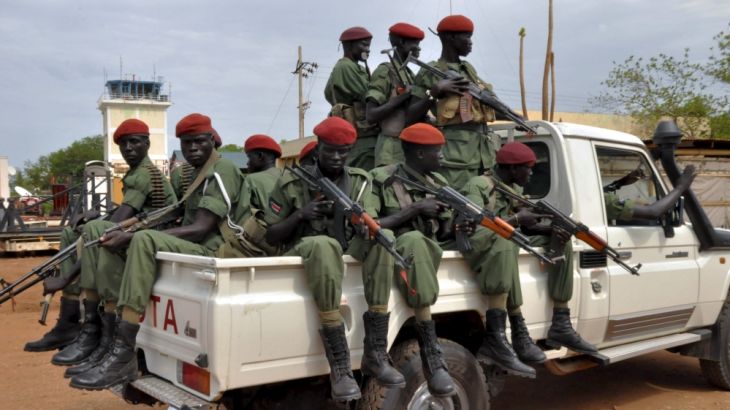 Members of the SPLM/A-In Opposition (IO) forces allied with South Sudan''s former rebel leader Machar ride on a pick-up truck as they welcome General Gatwech in Juba