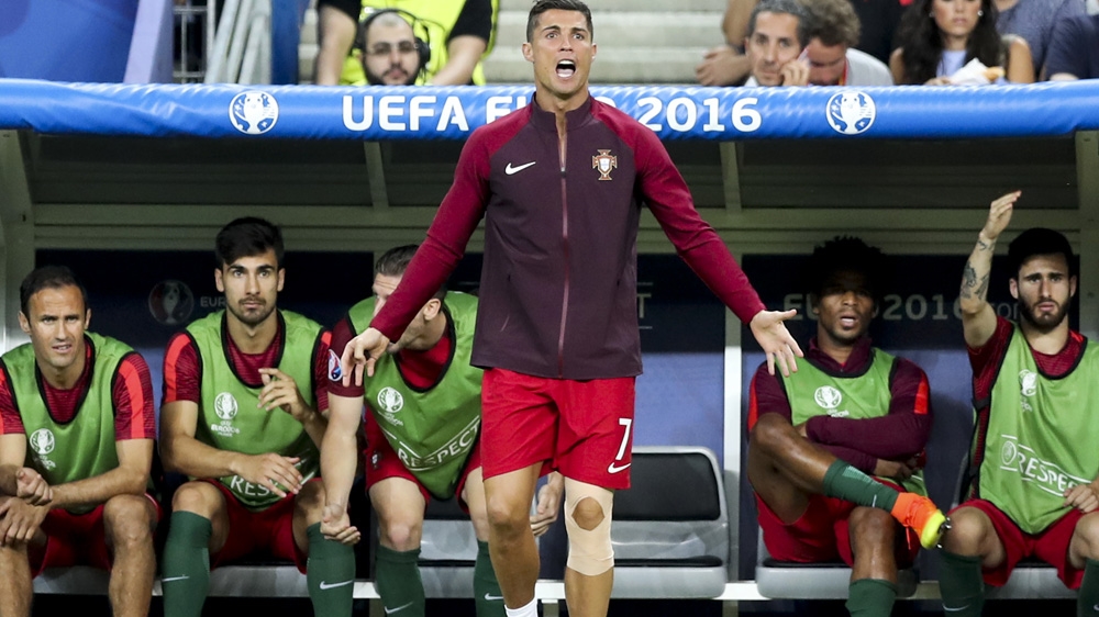 Ronaldo, Portugal's all-time leading scorer, went down after a heavy tackle from Dimitri Payet in the eighth minute and was substituted [EPA]