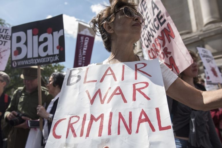 Protesters hold a demonstration as they wait for the release of the Chilcot Inquiry in London, Britain [EPA]