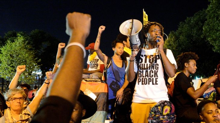 A Black Lives Matter protester addresses fellow protesters near the site of Democratic National Convention in Philadelphia