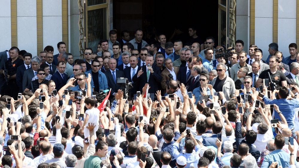 Turkish President Tayyip Erdogan addresses his supporters after the Friday prayers in Ankara [Reuters]