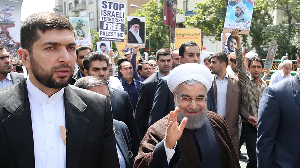 Iranian President Hassan Rouhani attended the anti-Israel rally in Tehran [President.ir/Handout via Reuters]