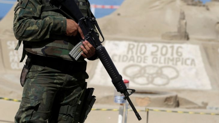A Brazilian Army Forces soldier patrols on Copacabana beach ahead of the 2016 Rio Olympic games in Rio de Janeiro
