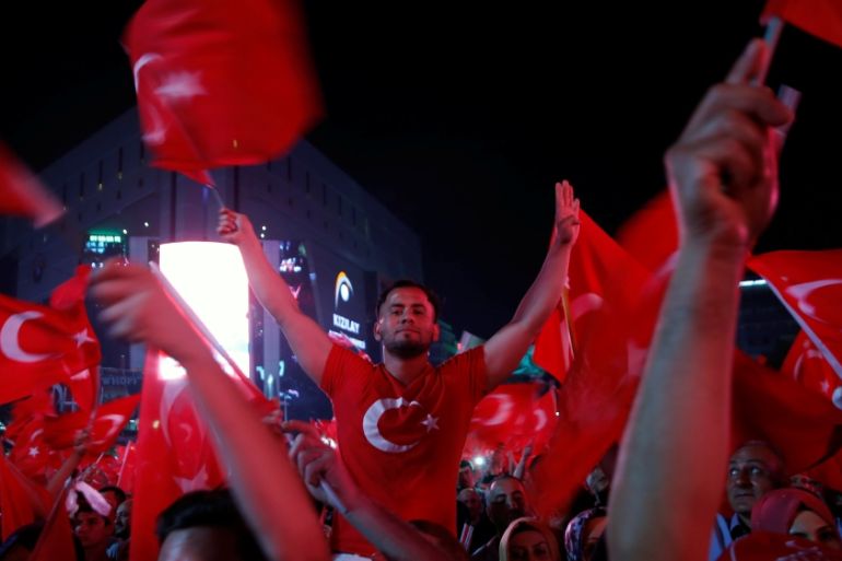 Supporters of Turkish President Tayyip Erdogan attend a pro-government demonstration in Ankara