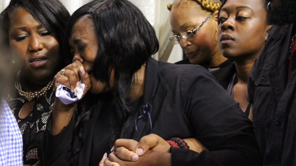 Sandra Sterling, the aunt who raised Alton Sterling, cries while attending the casket viewing [Jeffrey Dubinsky/Reuters]