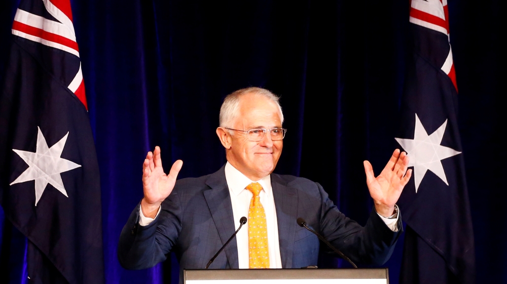 Turnbull sounded a confident tone during a speech to supporters early on Sunday morning [David Gray/Reuters]