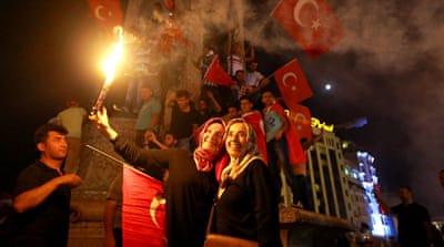 Anti-coup demonstrators celebrate their victory at Istanbul's Taksim Square [Reuters]