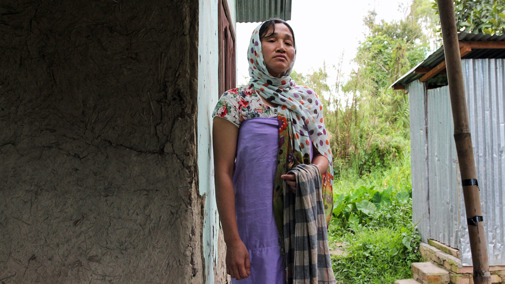 Kongkham Gangarani, who is blind, does all the housework after she lost her husband in 2008 [Neha Tara Mehta/Al Jazeera]
