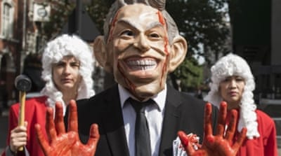 Protesters dressed as former British Prime Minister Tony Blair in London, Britain [EPA]