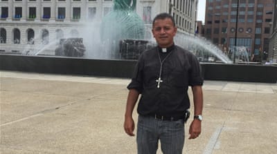 Father Jose Landaverde walked 360 miles to Cleveland to protest against Trump's anti-immigration line [Dalia Hatuqa/Al Jazeera]