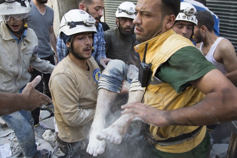 Syrian civil defence volunteers, known as the White Helmets, in Aleppo
