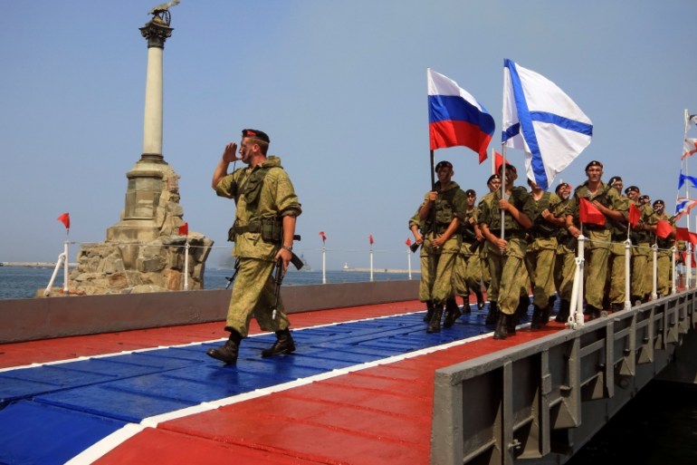 Russian marines parade during the Navy Day celebrations in Sevastopol