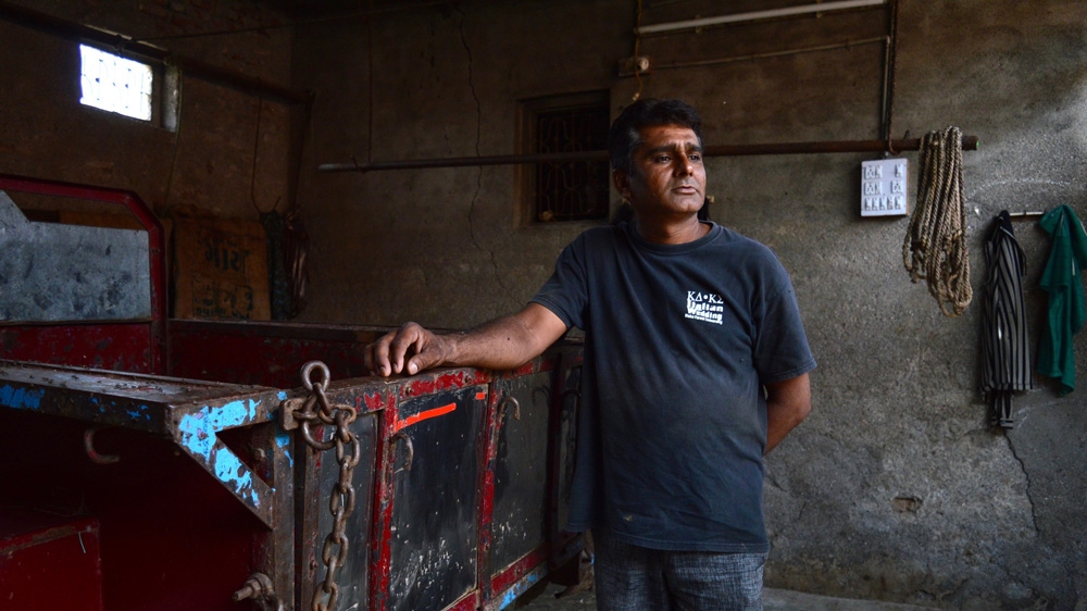 Narendra Rakhasiya, 40, has been a skinner since he was 15. His family has worked in the trade for generations, but he is adamant his sons will pursue other professions [Maya Prabhu/Al Jazeera]