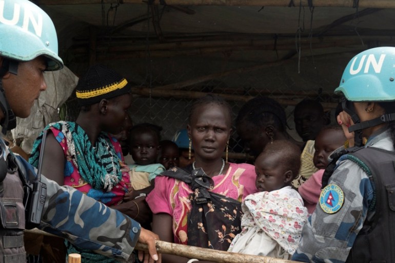 UN peacekeepers control South Sudanese wom