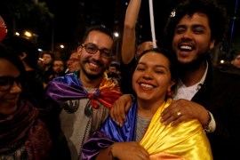 People celebrate after Colombia''s government and Revolutionary Armed Forces of Colombia (FARC) rebels reached a final peace deal on Wednesday to end a five-decade war, in Bogota, Colombia