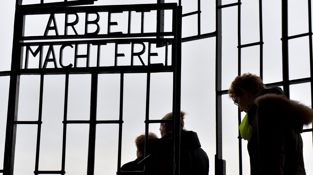 The gate of the former Sachsenhausen concentration camp, which bears the words 'Arbeit Macht Frei, or 'work sets you free', in Oranienburg, Germany [Bernd Settnik/EPA]