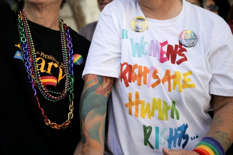 Two women show support for women''s rights and presumptive Democratic presidential nominee Hillary Clinton at San Francisco LGBT Pride Parade in San Francisco, California