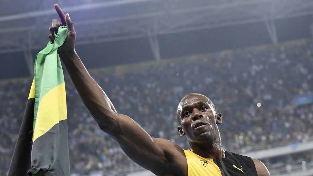 Slow out of the blocks but first one past the finish line, Bolt won his third successive Olympic 100m final [AFP]