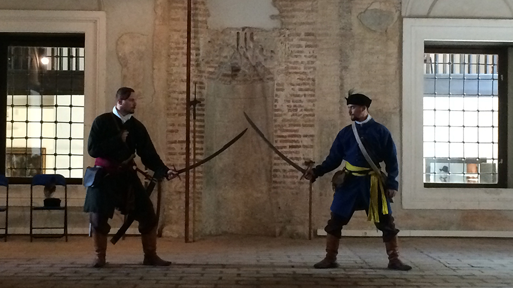 
Hungarian men recreate a fight between 16th-century Ottoman and Habsburg soldiers at Szigetvar castle, where the two empires' troops clashed 450 years ago [Dan McLaughlin/Al Jazeera]
