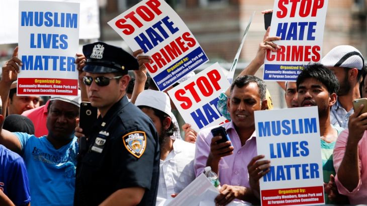Community members take part in a protest to demand stop hate crime during the funeral service of Maulama Akonjee, and Uddin in the Queens borough of New York City