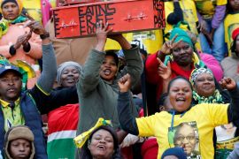 Supporters of the African National Congress (ANC) carry a mock coffin of the opposition South Africa''s Economic Freedom Fighters (EFF)