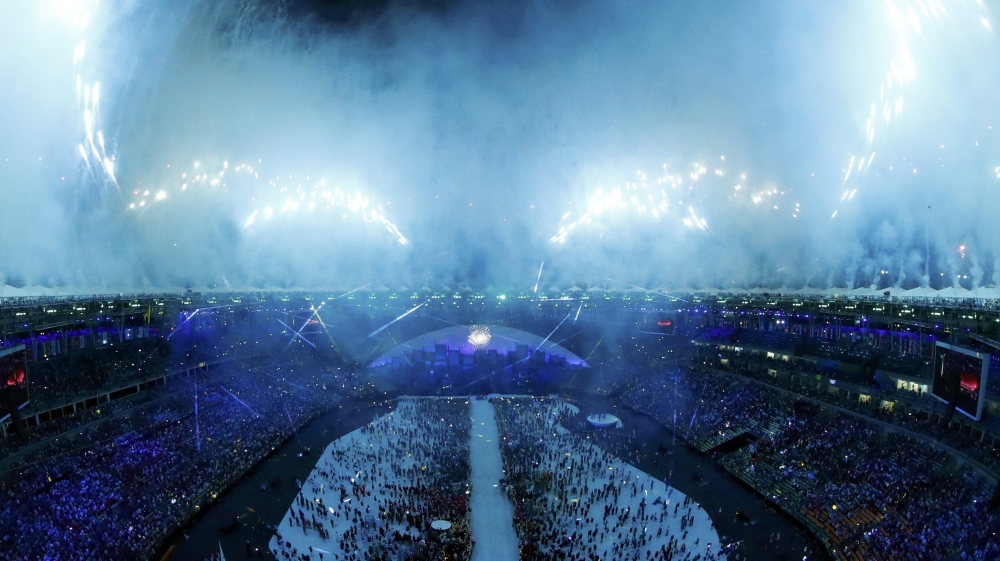 Fireworks explode during the opening ceremony in Maracana stadium [Pawel Kopczynski/Reuters]