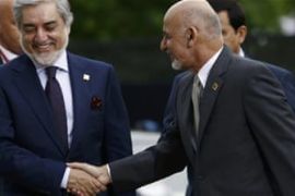 Afghanistan''s President Ghani shakes hands with Afghanistan''s Chief Executive Abdullah as they arrive for the NATO Summit in Warsaw