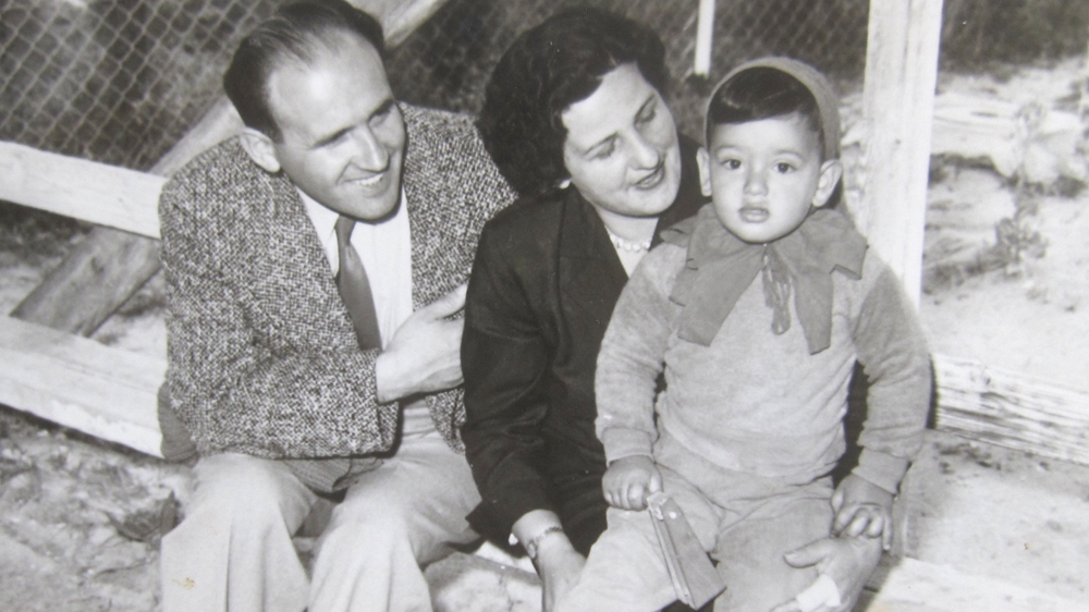 Grunbaum is pictured in the late 1950s with his adoptive parents [Courtesy of Gil Grunbaum]
