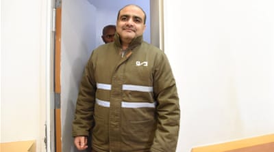 Mohammad el-Halabi was allegedly tortured by Israeli authorities before he was charged with funnelling millions of dollars in aid money to Hamas [Reuters]