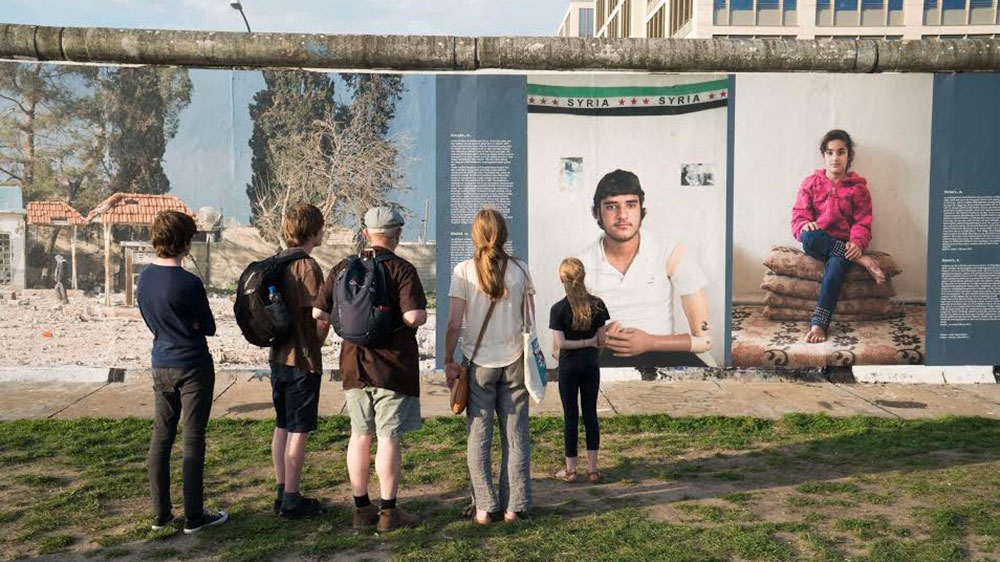 Panoramic images are displayed on the remains of the three-metre-high Berlin Wall [Courtesy of Kai Wiedenhofer]