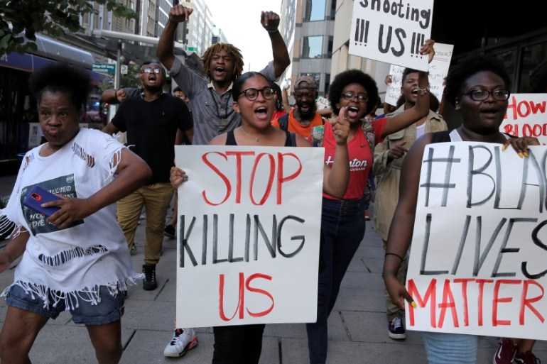Demonstrators with Black Lives Matter march during a protest in Washington.