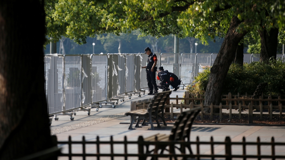 Security personnel install fence as they close the West Lake before the G20 summit in Hangzhou Security [Reuters]