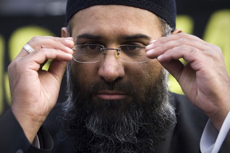 Islamic preacher Choudary addresses members of the media during a protest supporting the Shari''ah Law, in north London