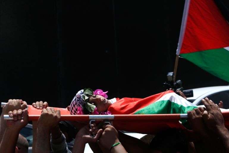File: body of Muhey al-Tabakhi, 12, who was killed after clashes erupted between Israeli forces and protesters in the West Bank
