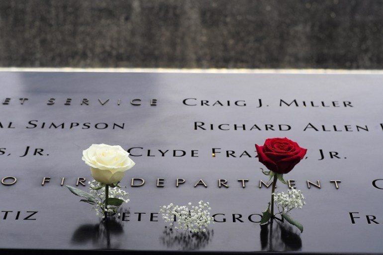 Flowers posted in the names of the victims on the edges of the 9/11 Memorial, where Pope Francis will visit later in the day in New York, New York [EPA]