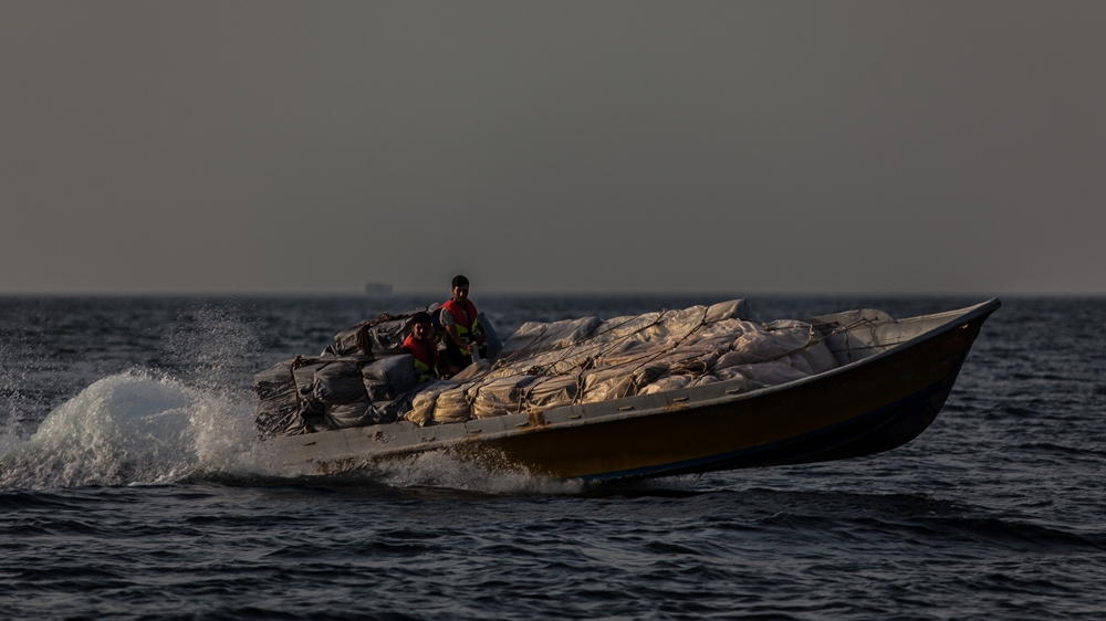 Locally known as 'shooties', these men regularly cross the Strait of Hormuz to smuggle various products into Iran [Sebastian Castelier/Al Jazeera] 