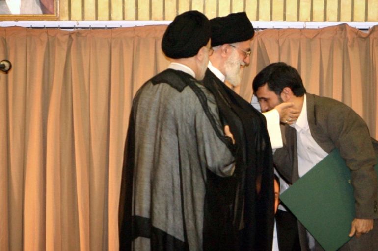 Iranian President Mahmoud Ahmadinejad kisses the hand of Supreme Leader Ayatollah Ali Khamenei