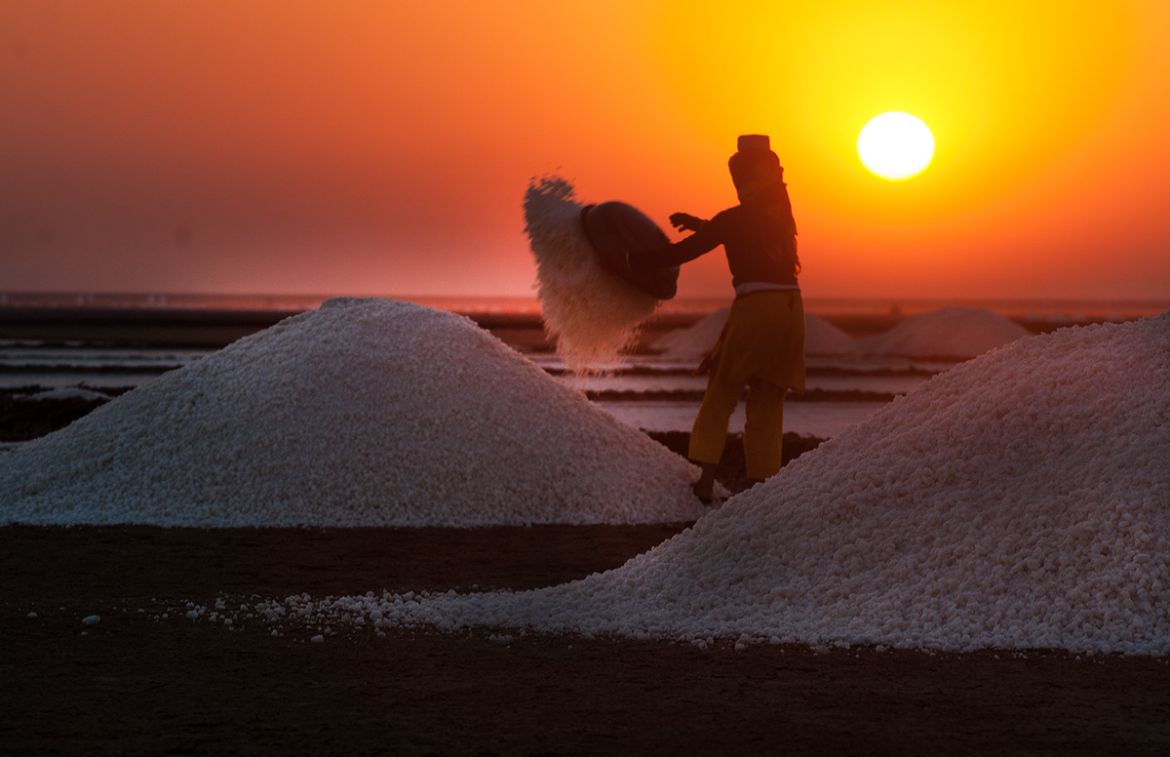 Another day begins in the salt plains of Kutch, which produces 76 percent of India’s total salt production. [Sugato Mukherjee/Al Jazeera]
