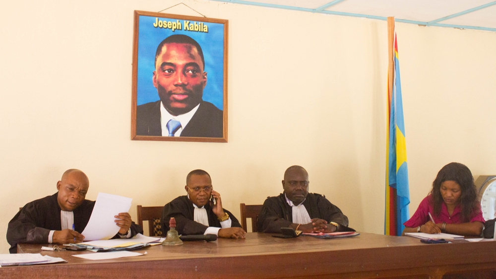 The judiciaries of the main court of Bunia during a mobile court trial in February 2016 [Katya Cengel/Al Jazeera]