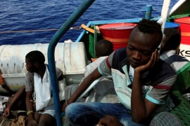 Issam Ibraheem, 13, a migrant from Darfur sits inside Iuventa vessel after he was rescued from an overcrowded dinghy by members of the German NGO Jugend Rettet durin