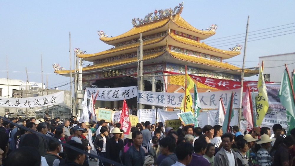File photo: Wukan residents gather for a rally in December 2011 [Reuters]