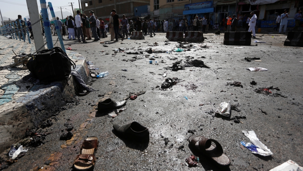 The shoes of victims are seen at the site of a blast in Kabul, Afghanistan, July 23, 2016 [Omar Sobhani/Reuters]
