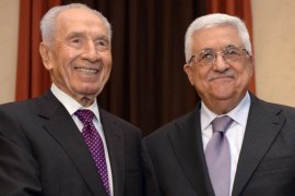 Palestinian President Mahmoud Abbas and Shimon Peres at the World Economic Forum being held in the Dead Sea area in Jordan, March 2013 [EPA]