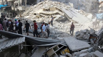People inspect the damage at a market hit by air strikes in Aleppo's rebel-held Fardous district, Syria [Reuters]